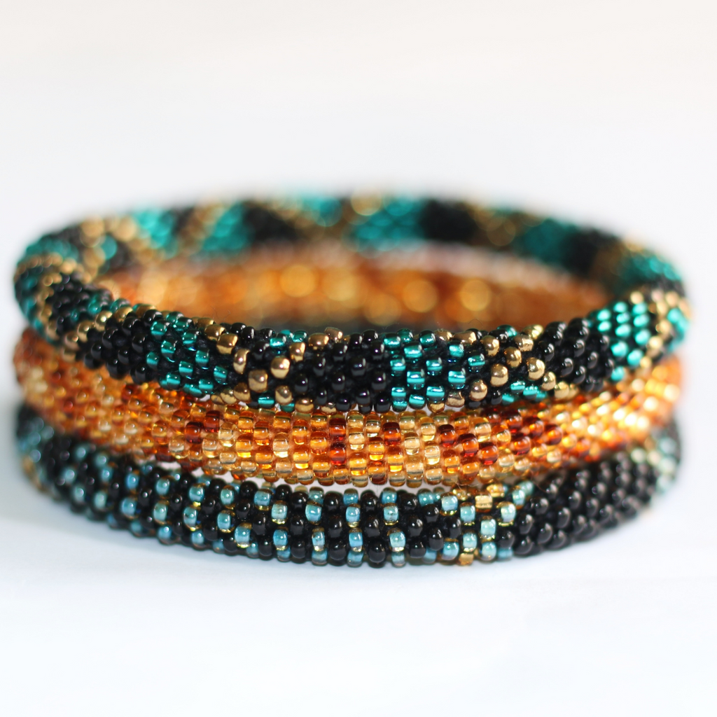 ROLL-ON PERLEARMBÅND FRA NEPAL - Amber