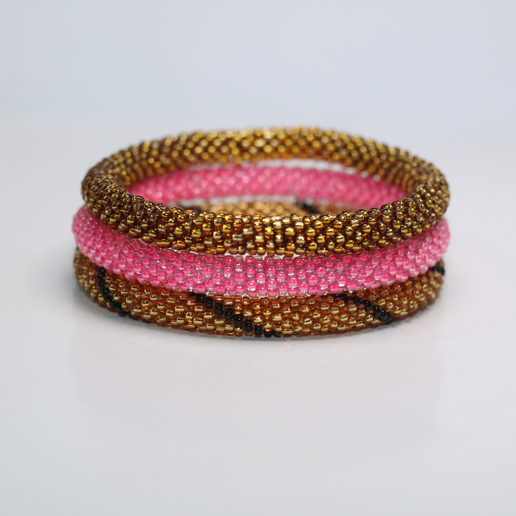 ROLL-ON PERLEARMBÅND FRA NEPAL - Klar guld med sort detalje