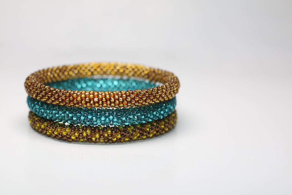 ROLL-ON PERLEARMBÅND FRA NEPAL - Guld